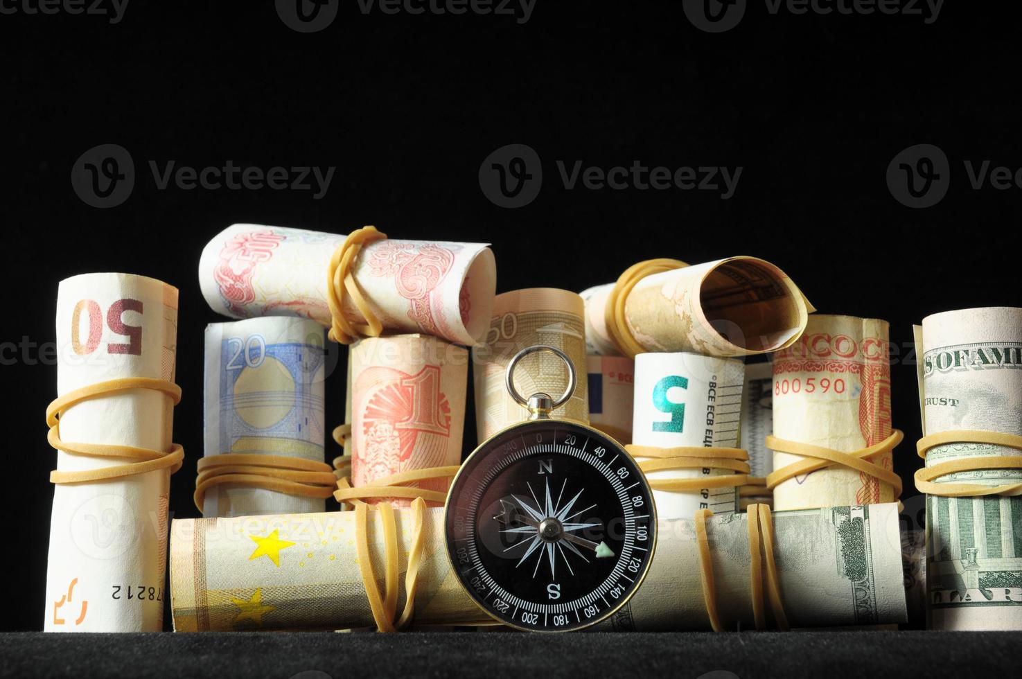 Banknotes and a compass photo