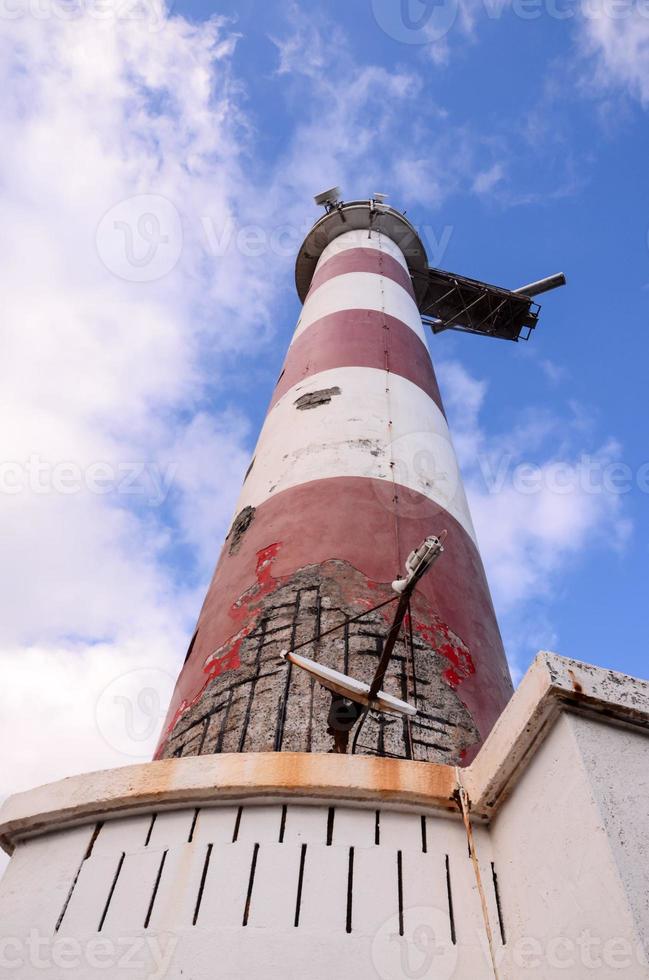 Lighthouse by the sea photo
