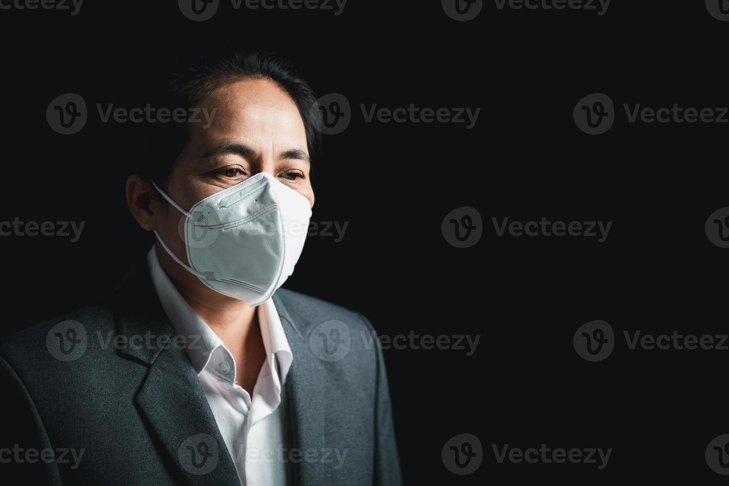 Woman wearing N95 PM 2.5 respiratory protection mask against air pollution and dust particles exceed safety limits. Healthcare, environmental, ecology concept. Allergy, headache. air danger in city. photo