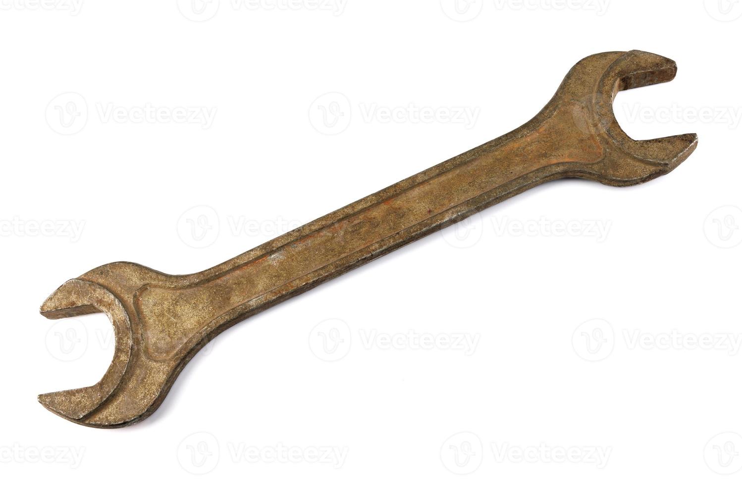 Old wrench isolated on white background. rusty wrench. photo