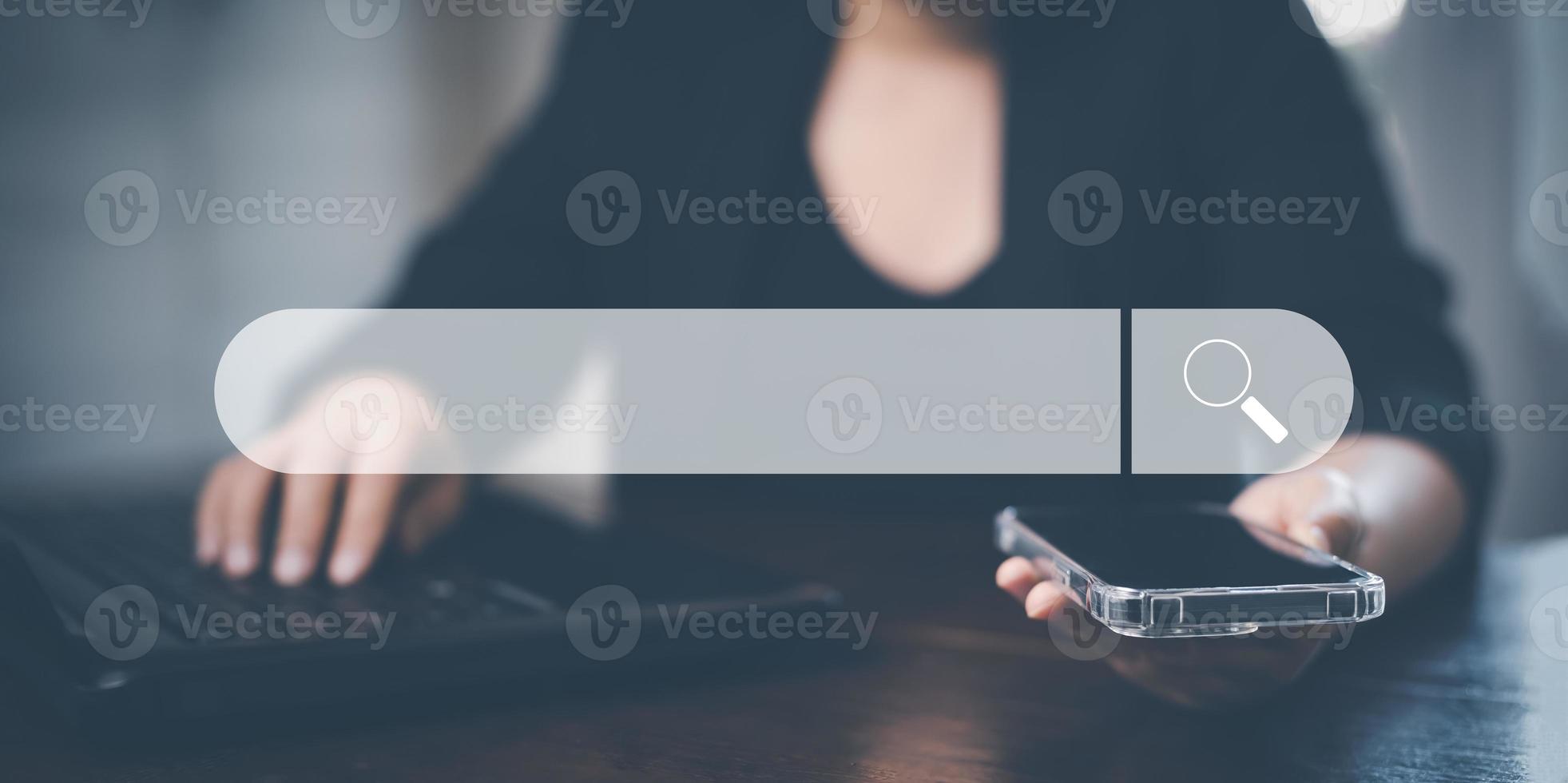 Searching Browsing Internet Data Information with blank search bar. man's hands are using smartphone and keyboard to Searching for information. Using Search Console with your website. photo