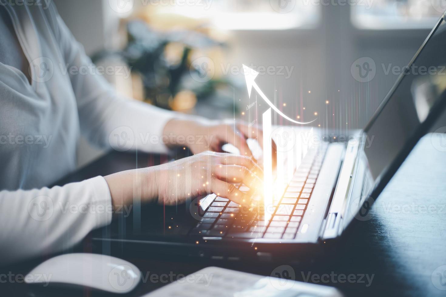 Tablet and finance technology and investment concept. Stock Market Investments Funds and Digital Assets. Woman using laptop or computer and trading graph financial data. Business finance background. photo