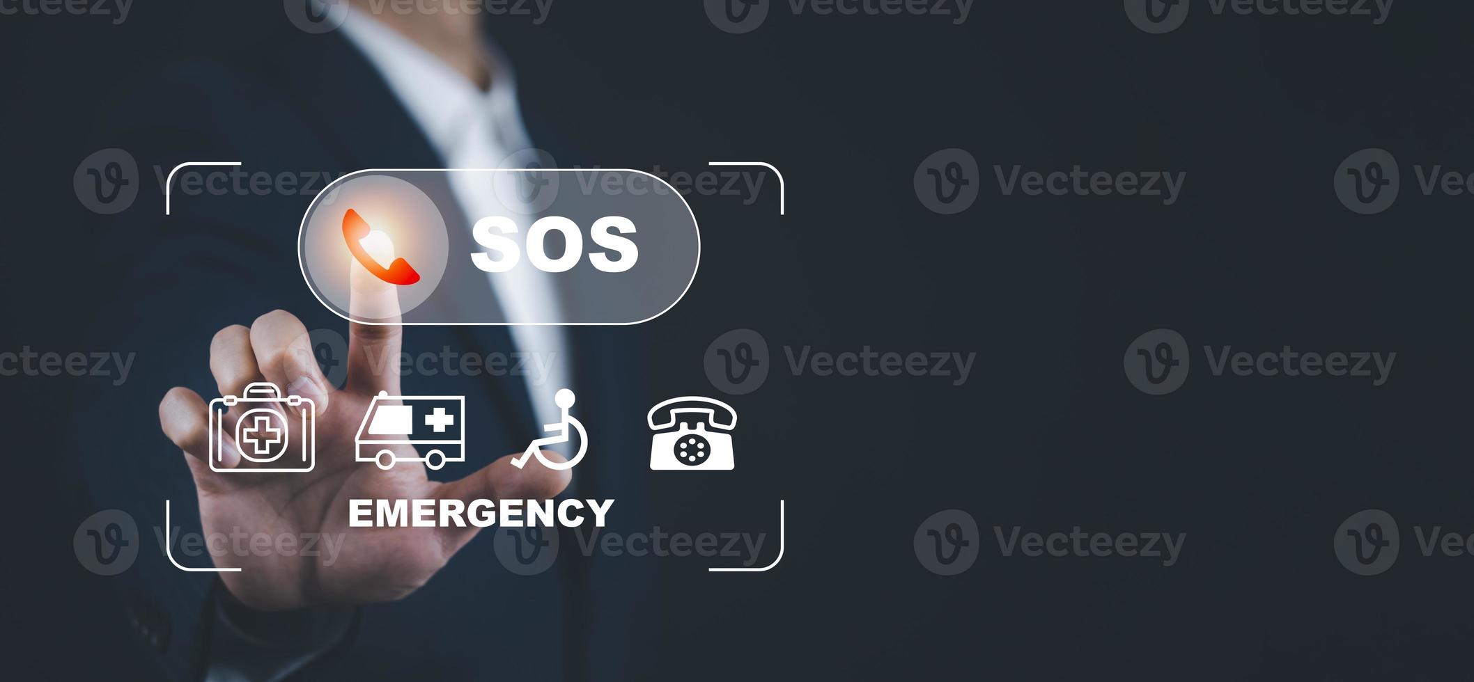 Hand touch button Emergency app in home, call phone, Chat message icon, Emergency application from smartphone for elderly, technology concept.Old hand touch mobile phone and call for help. photo