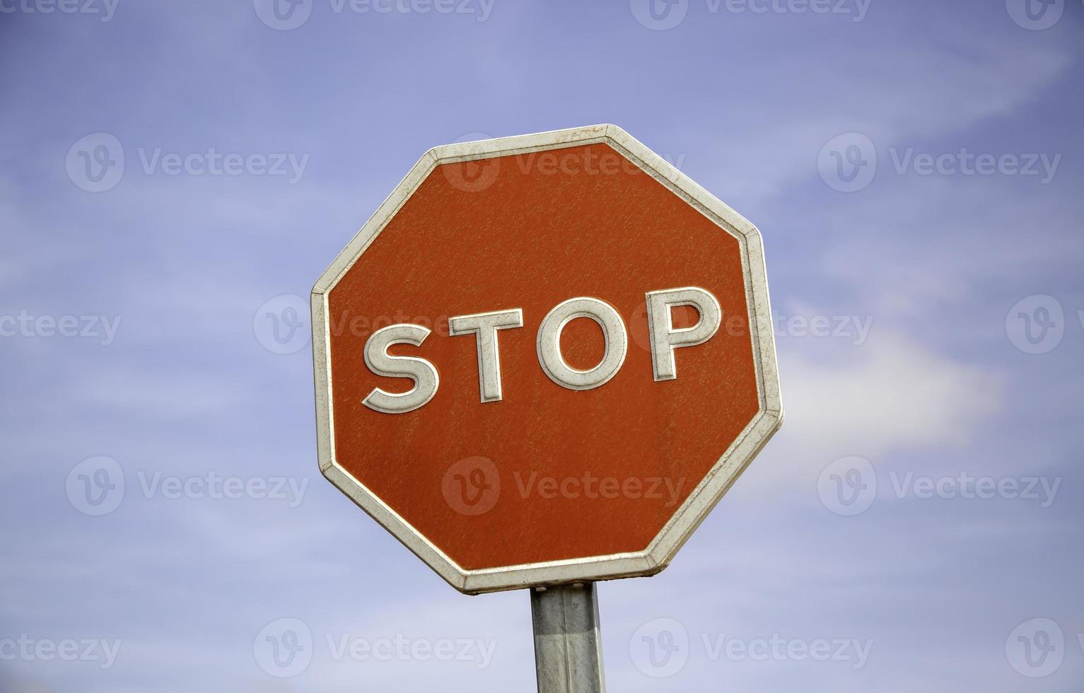 Stop sign with sky photo