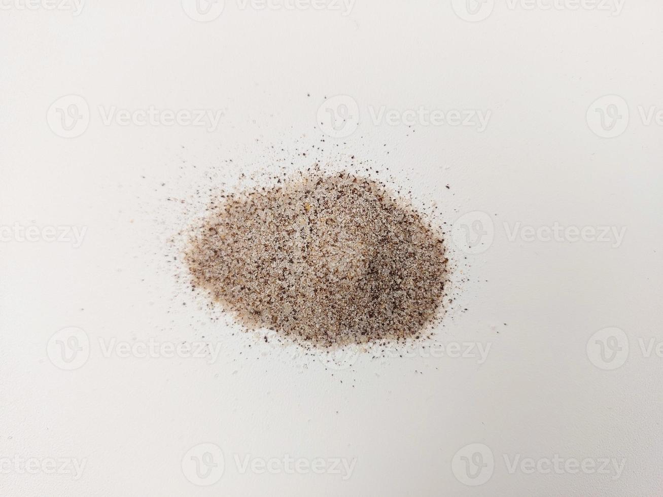 coffee grounds that should be scattered on a white background photo