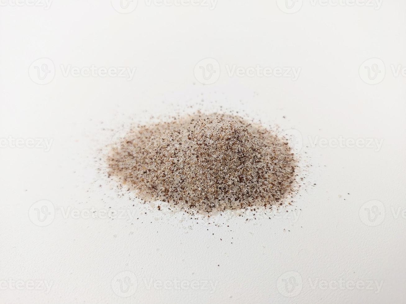 coffee grounds that should be scattered on a white background photo