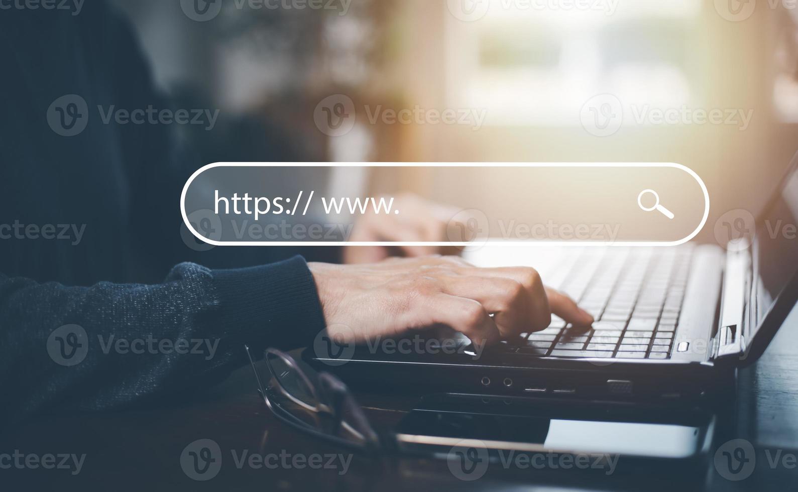 Searching Browsing Internet Data Information with blank search bar. man's hands are using smartphone and keyboard to Searching for information. Using Search Console with your website. photo