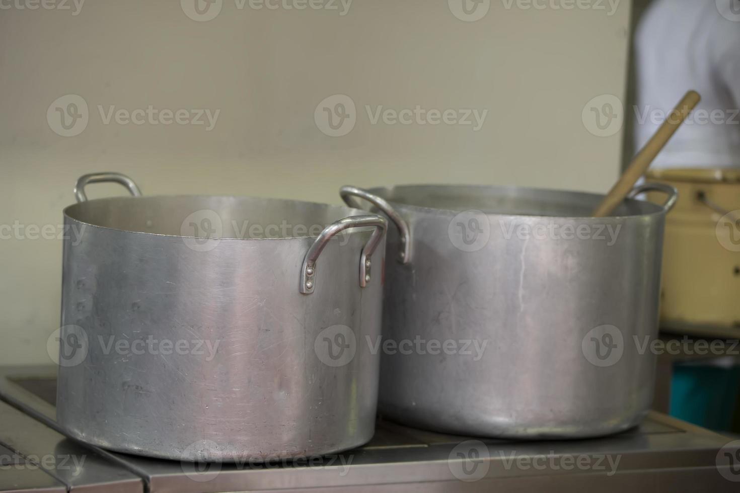 Large metal pans in an industrial kitchen. photo