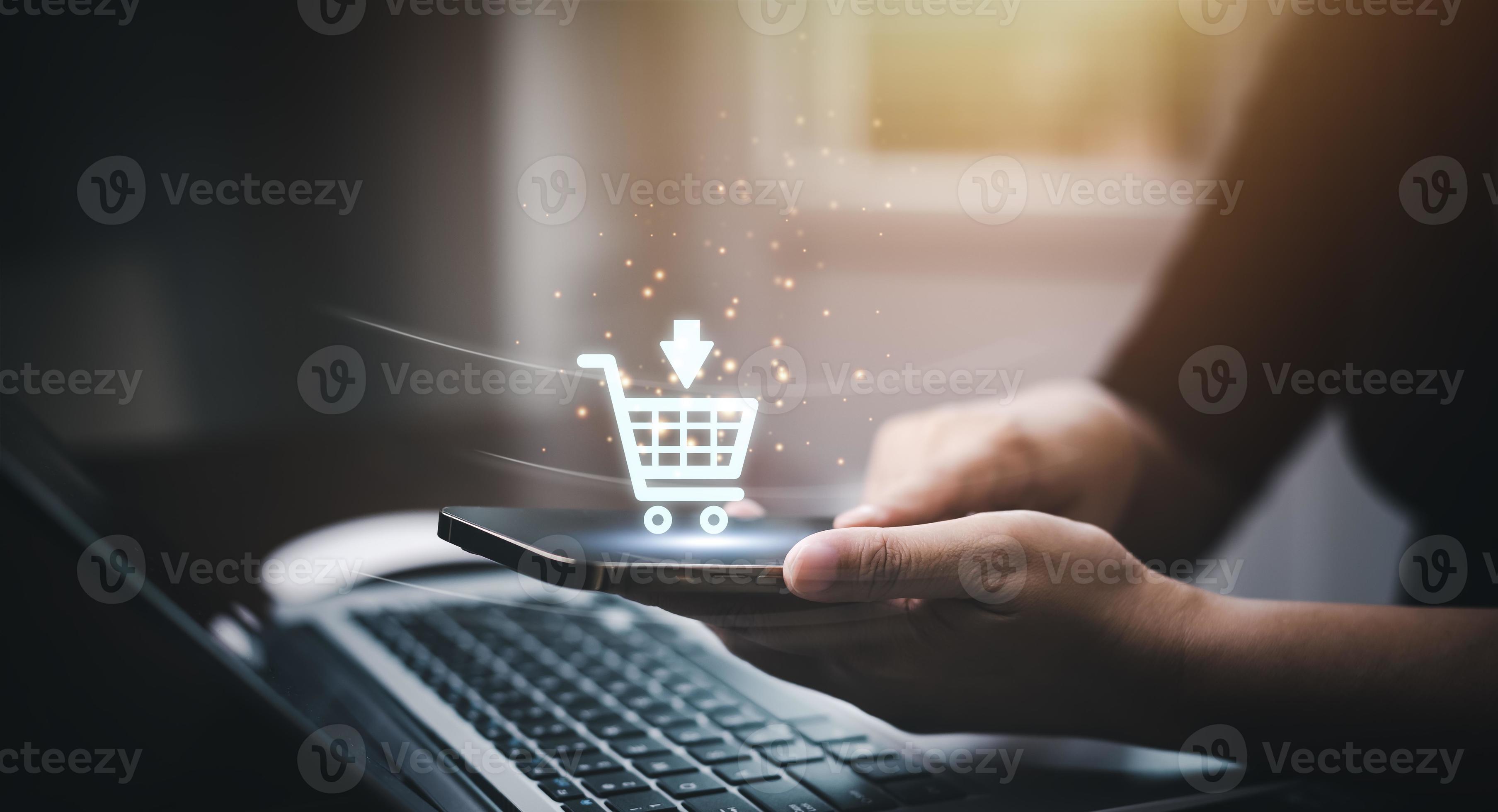 Businessman using a laptop with online shopping concept marketplace