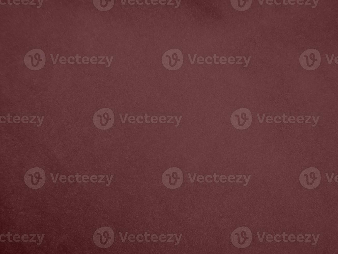 Winter Berry color dark red velvet fabric texture used as background. red fabric background of soft and smooth textile material. There is space for text. photo