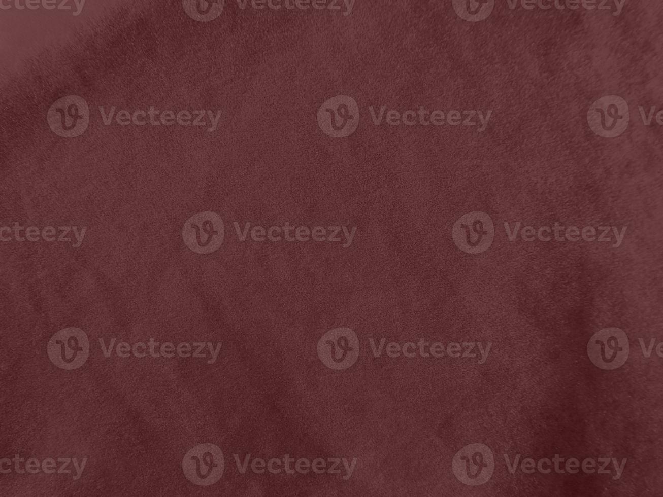 Winter Berry color dark red velvet fabric texture used as background. red fabric background of soft and smooth textile material. There is space for text. photo