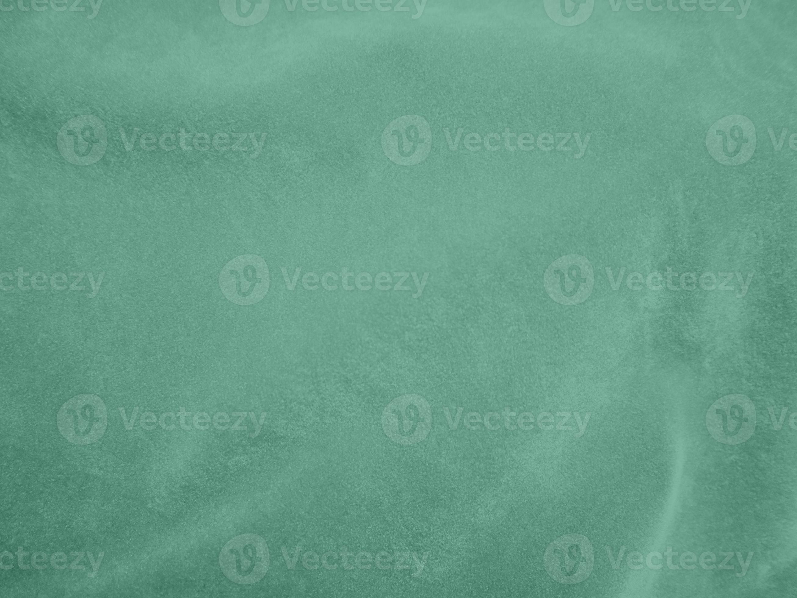 Padua green velvet fabric texture used as background.Light green fabric