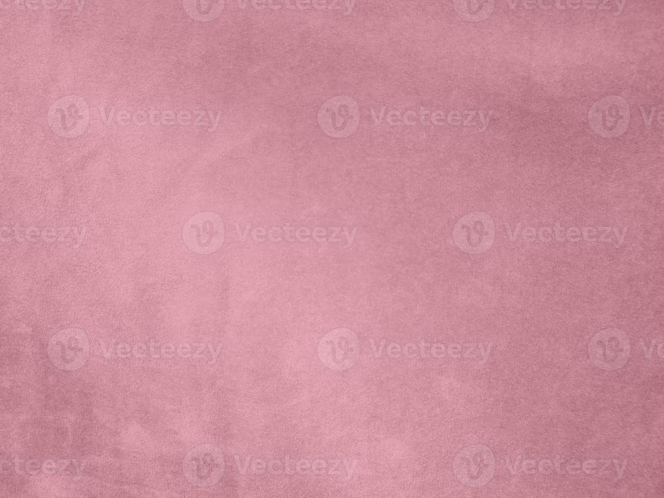 rose gold color velvet fabric texture used as background. Empty pink gold fabric background of soft and smooth textile material. There is space for text. photo