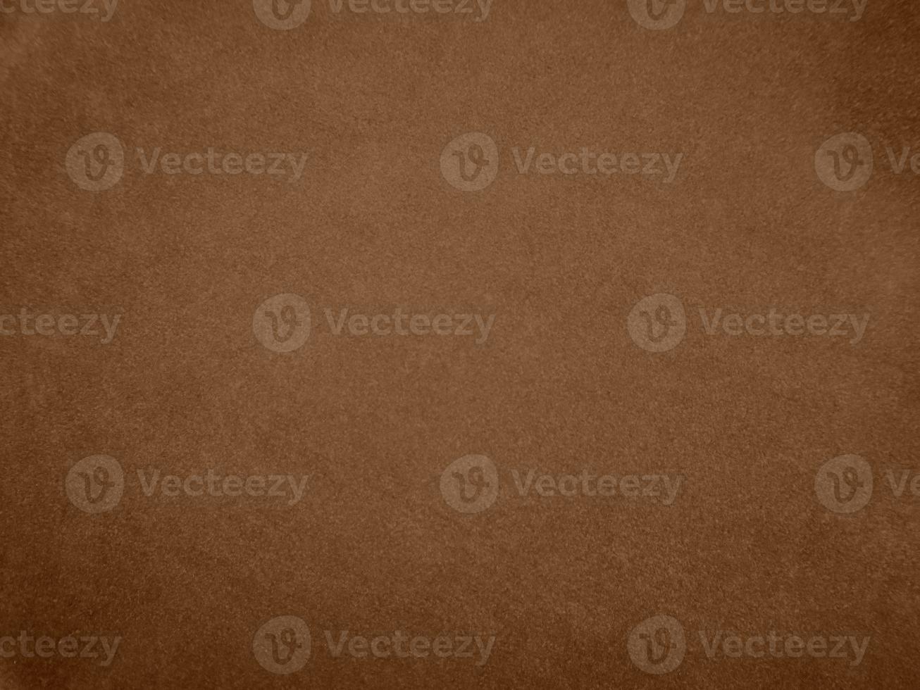 Brown color velvet fabric texture used as background. Empty brown fabric background of soft and smooth textile material. There is space for text. photo