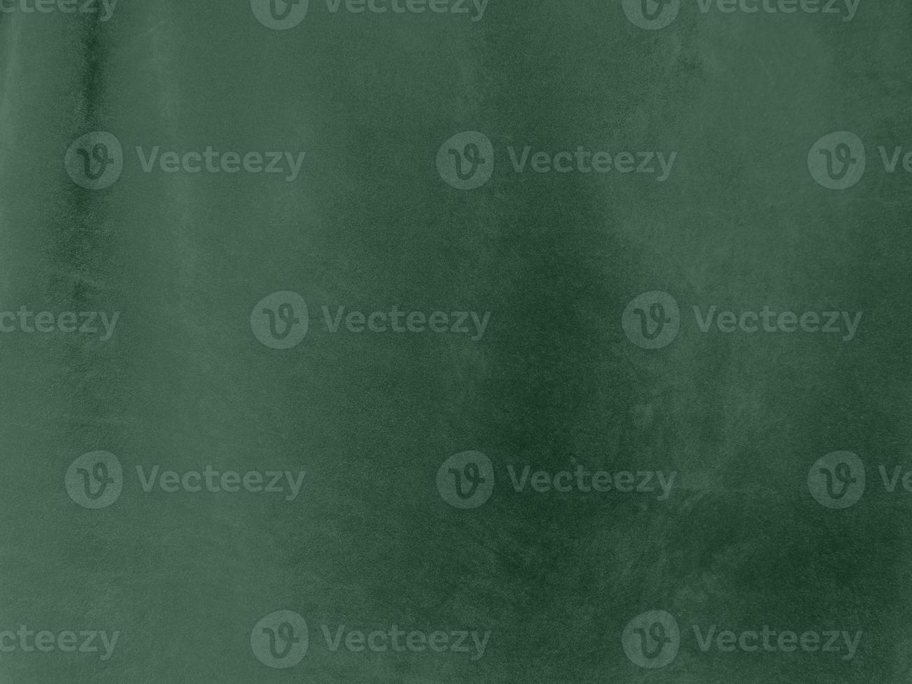 Olive green color velvet fabric texture used as background. light Olive green fabric background of soft and smooth textile material. There is space for text. photo