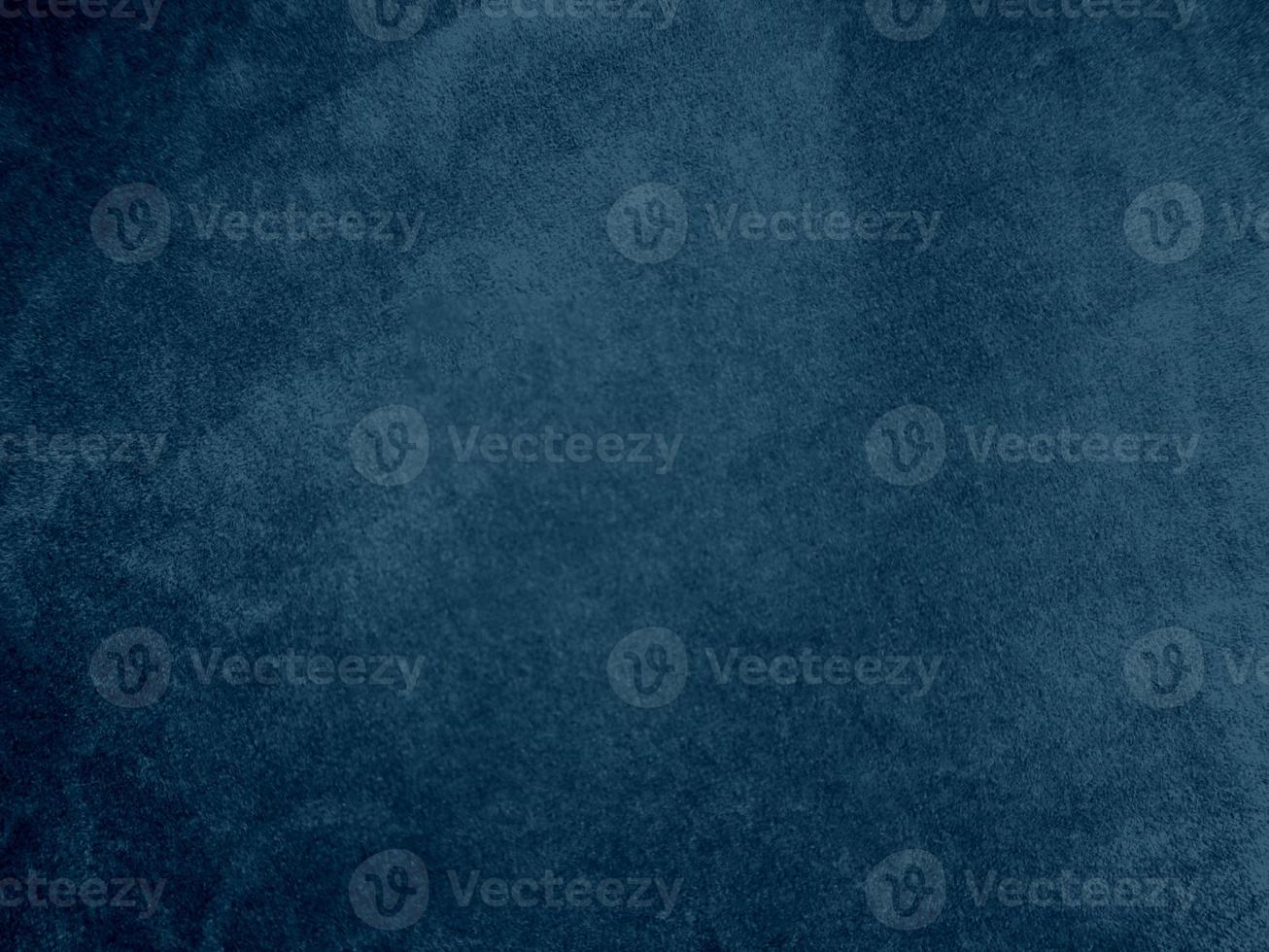 Navy blue velvet fabric texture used as background. Empty blue fabric background of soft and smooth textile material. There is space for text. photo