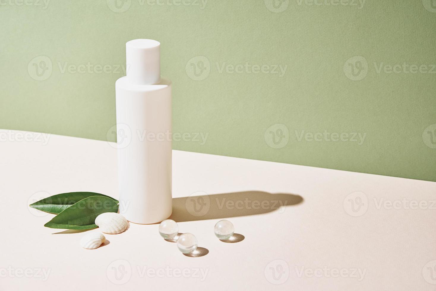 Cosmetics beauty mockup. White bottle on pastel background photo