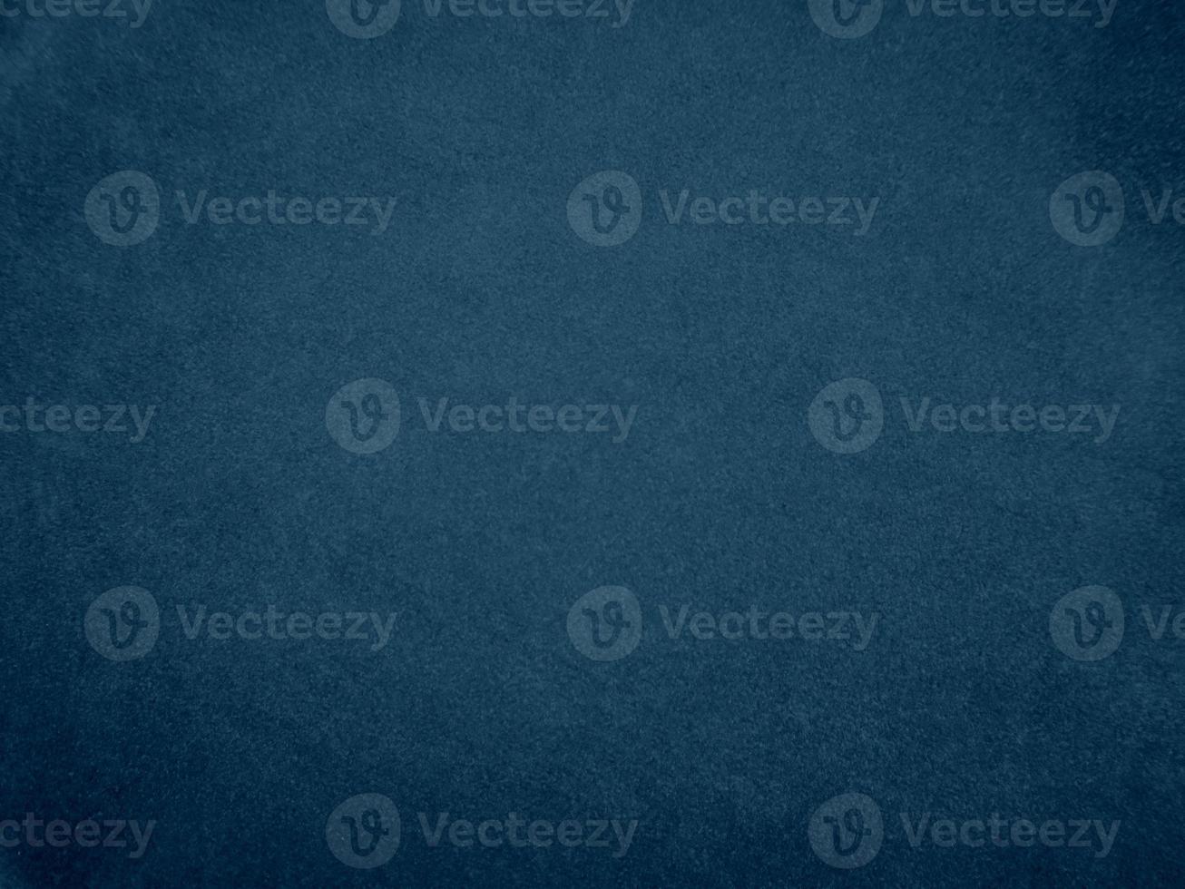 Navy blue velvet fabric texture used as background. Empty blue fabric background of soft and smooth textile material. There is space for text. photo