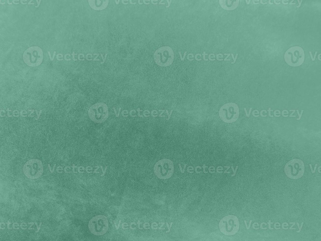 Padua green velvet fabric texture used as background.Light green fabric background of soft and smooth textile material. There is space for text. photo