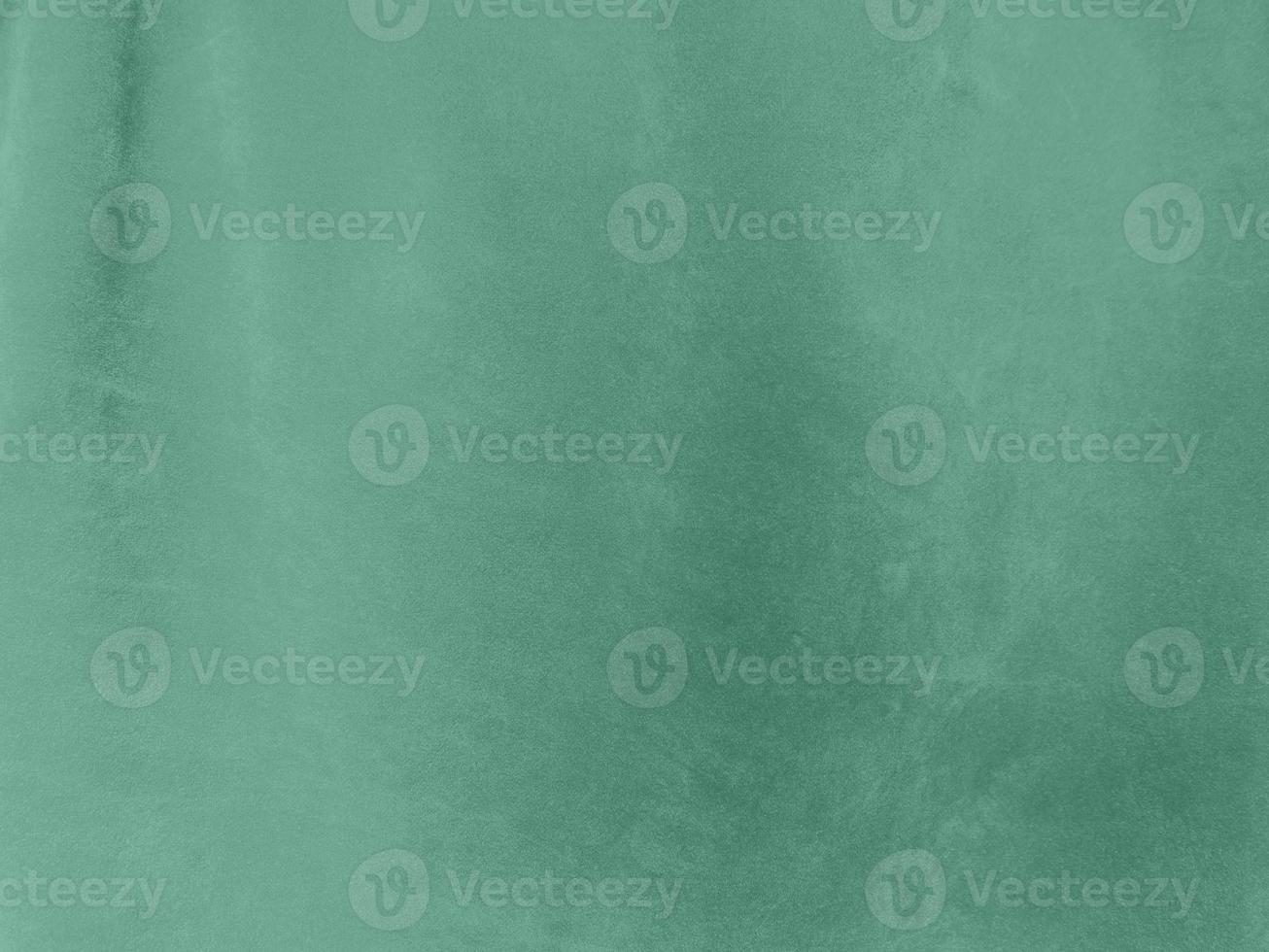 Padua green velvet fabric texture used as background.Light green fabric background of soft and smooth textile material. There is space for text. photo