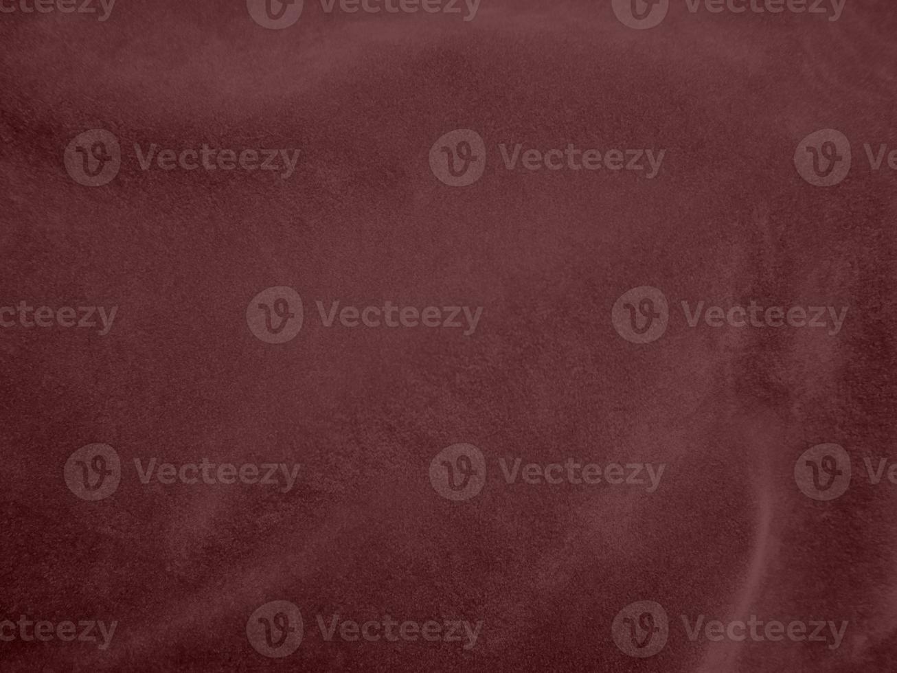 Winter Berry color dark red velvet fabric texture used as background. red fabric background of soft and smooth textile material. There is space for text. photo