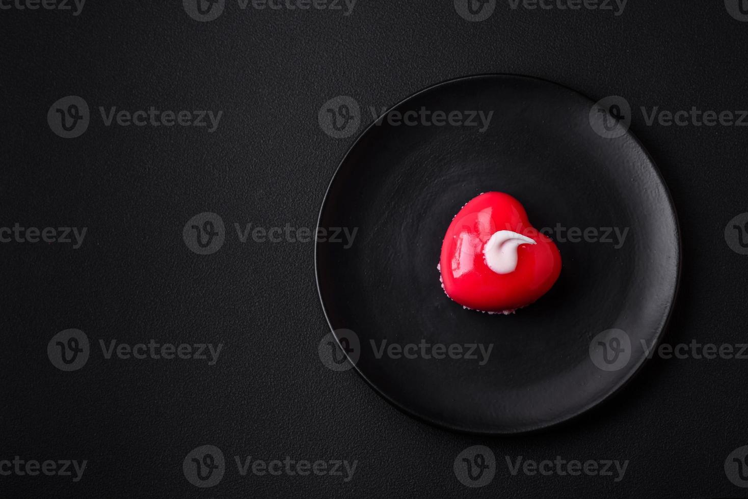 Beautiful tasty cake red color cheesecake in the shape of a heart photo