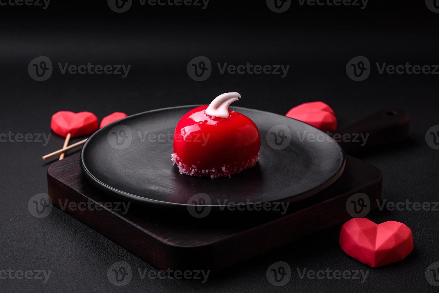 Beautiful tasty cake red color cheesecake in the shape of a heart photo