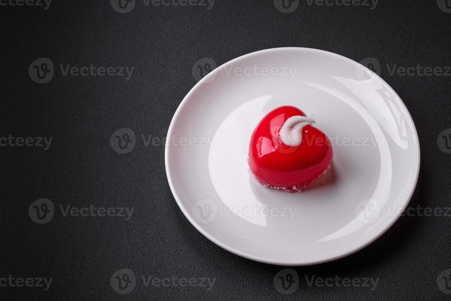 Beautiful tasty cake red color cheesecake in the shape of a heart photo