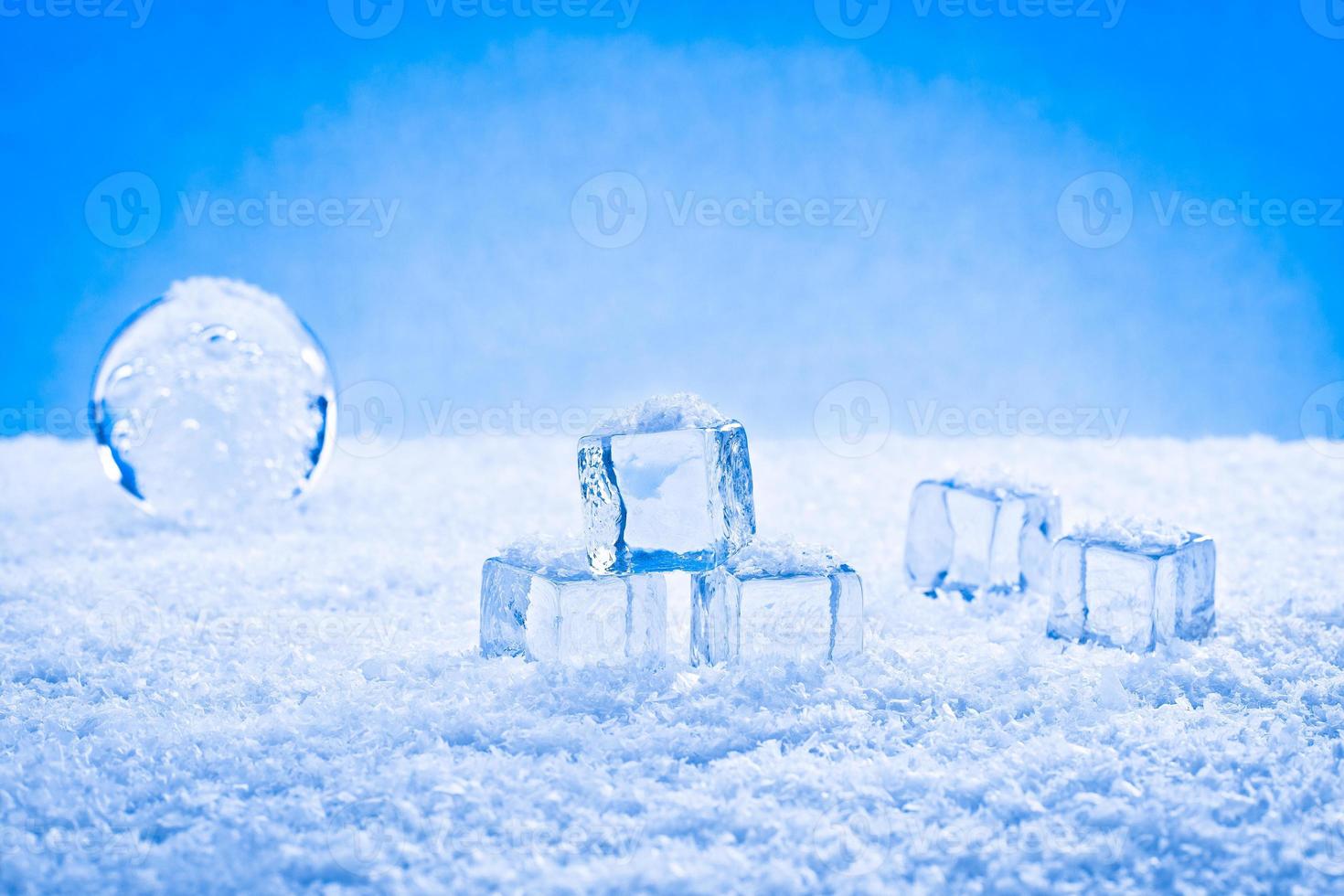 wet ice cubes and snow photo