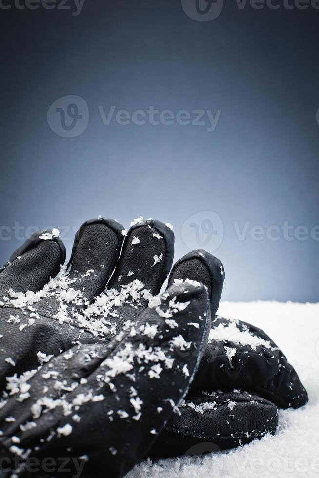 Gloves over the snow photo