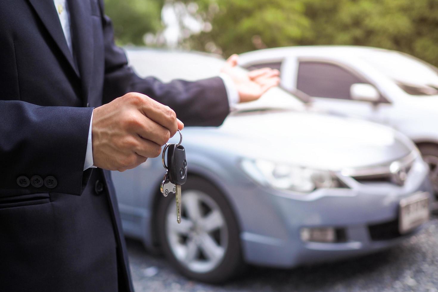 Car salesman and driving test service photo