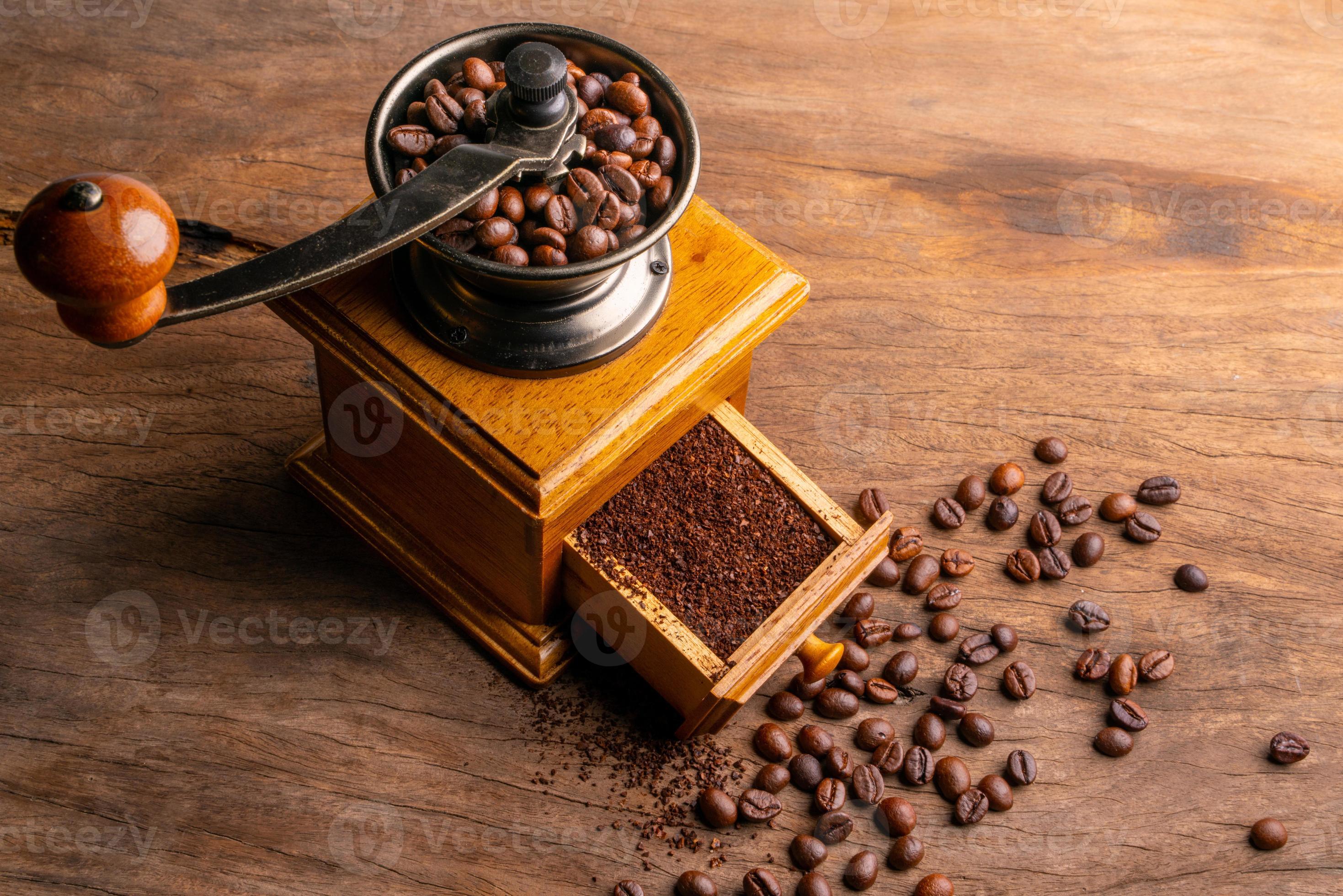 Vintage coffee grinder.Old retro hand-operated wooden and metal