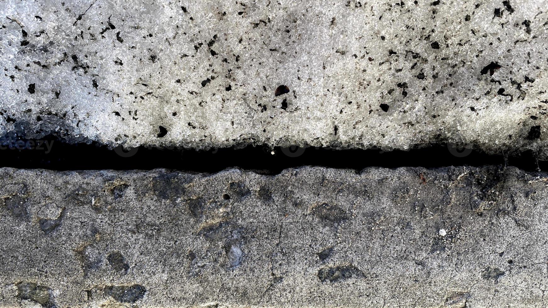 Stone snow texture macro photo