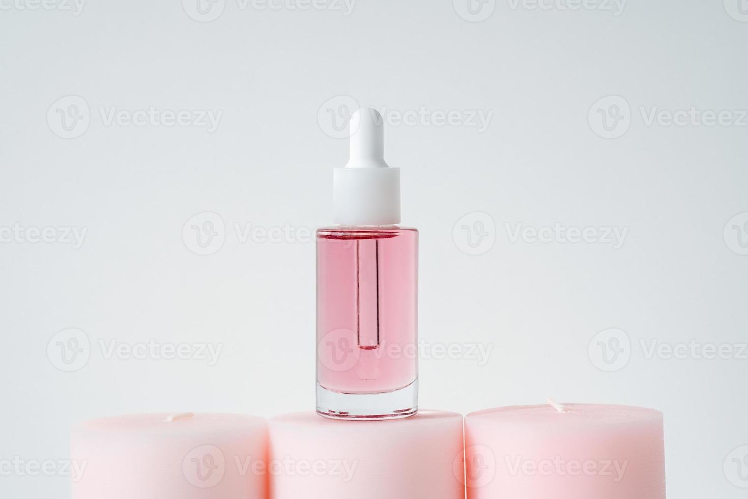 pink face oil and candles photo