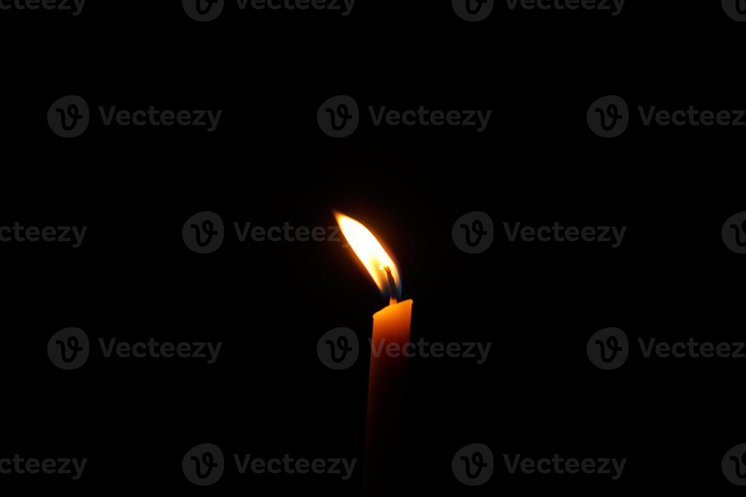 Candlelight at night that illuminates things photo
