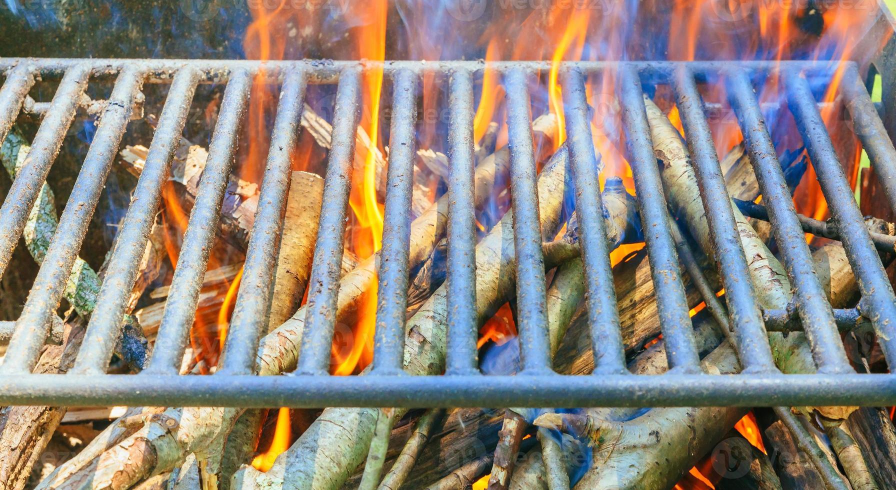 camp fire in   pit at  campsite photo