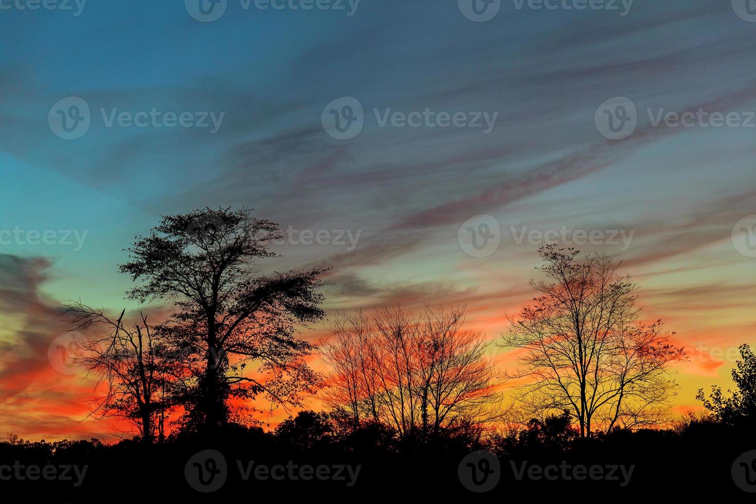 Bright colorful sunset on the sea with beautiful clouds photo