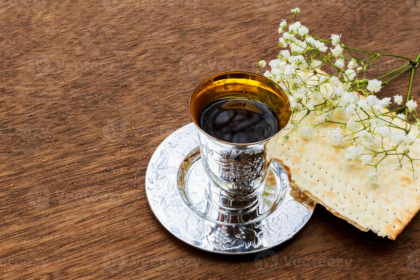 Still-life with wine and matzoh jewish passover bread photo