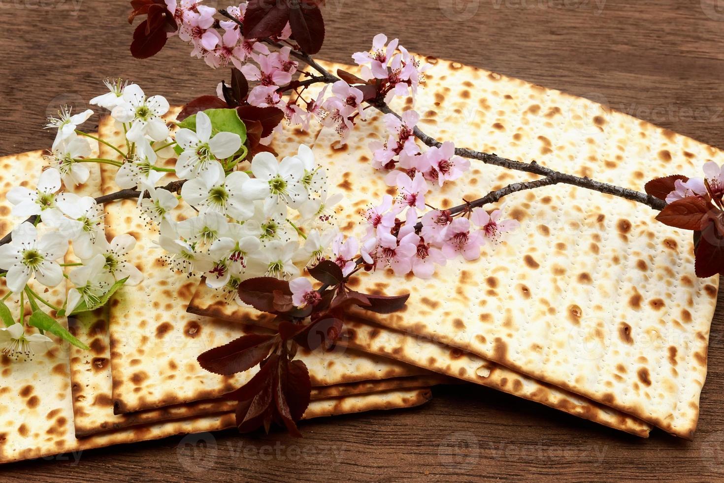 Pesach Still-life with wine and matzoh jewish passover bread photo