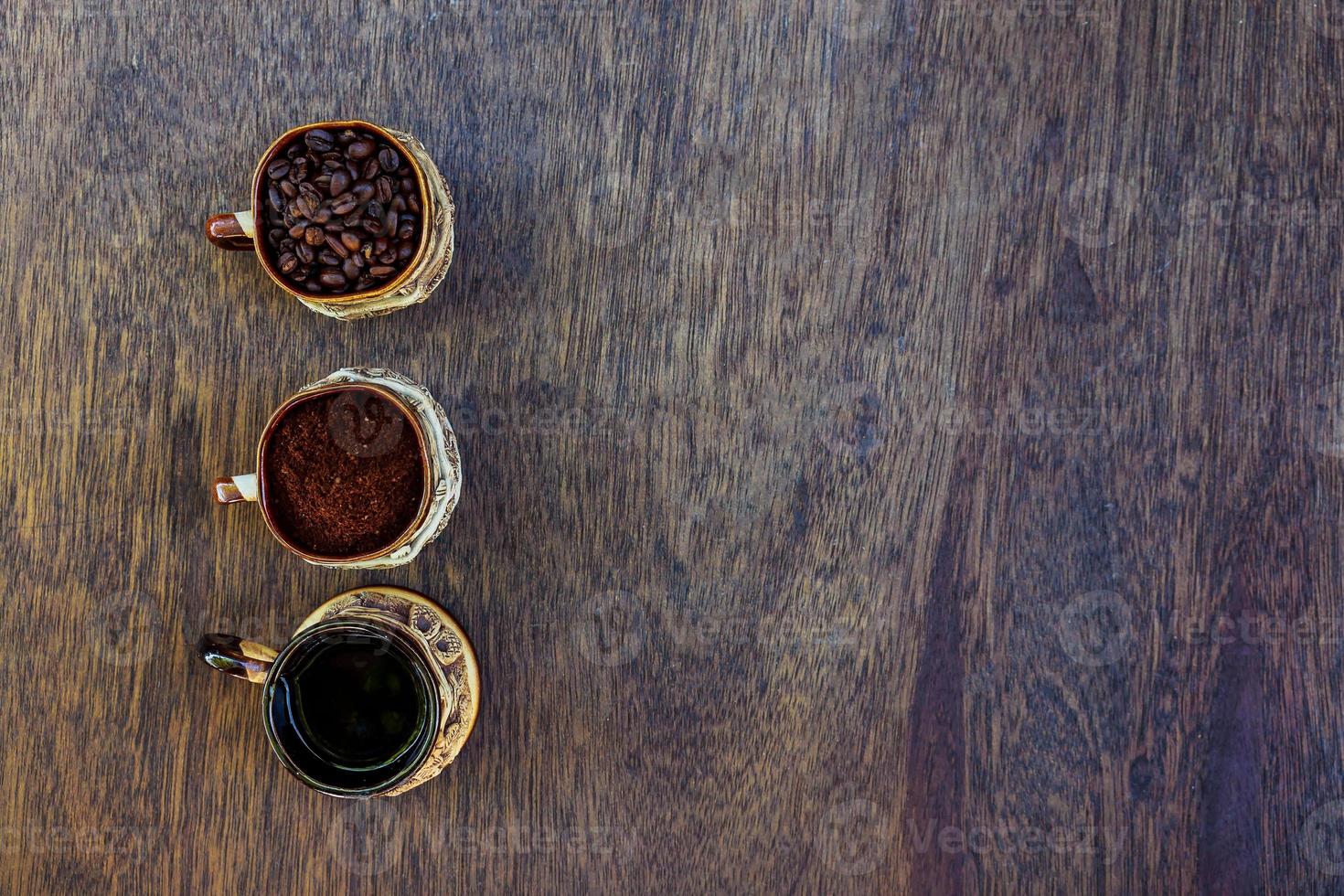 Coffee cup, beans and ground photo