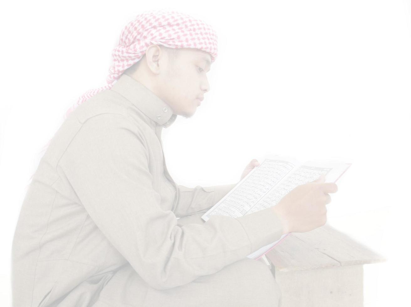 Indonesia. 31 January 2023. Photo of man reading a quran ready for Ramadan.