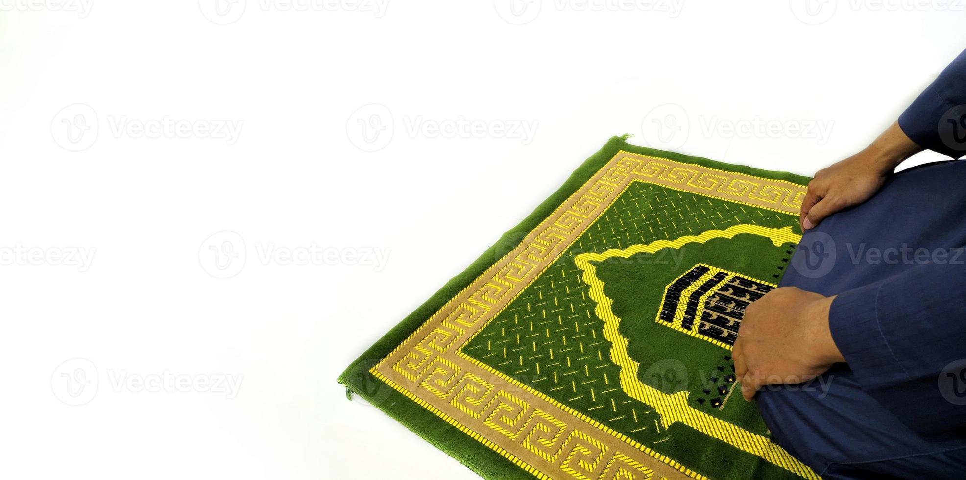 Man Holding and reading quran. Islamic Background photo