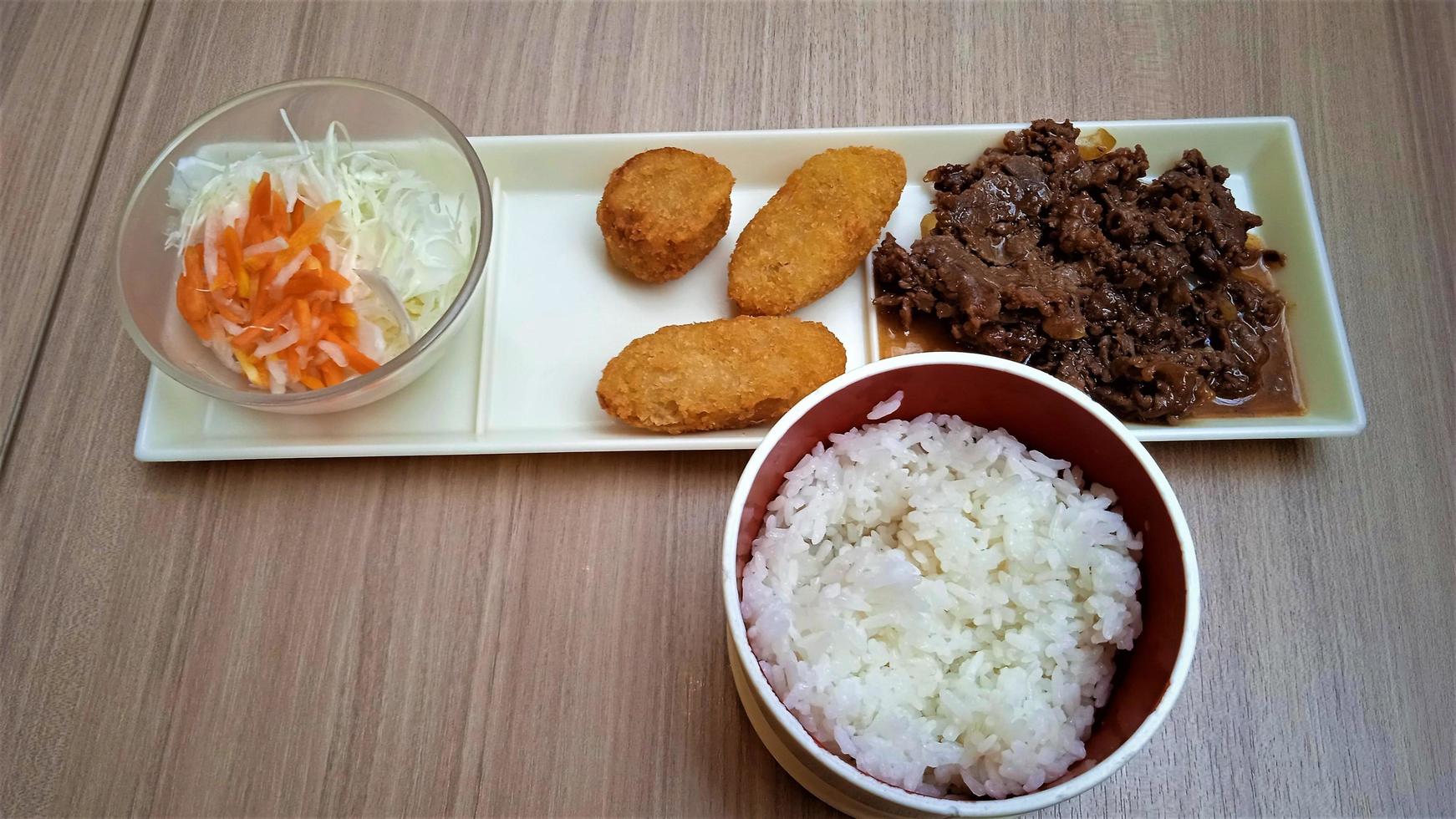 Japanese food on a wooden table, in a Japanese restaurant photo