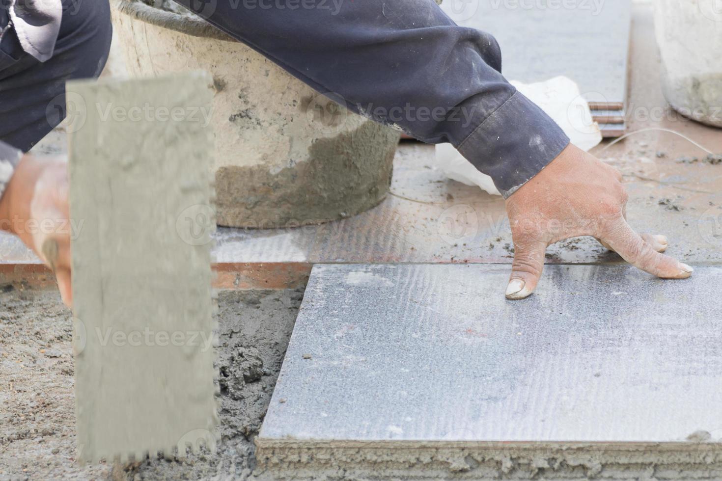 Mason tiling on floor photo