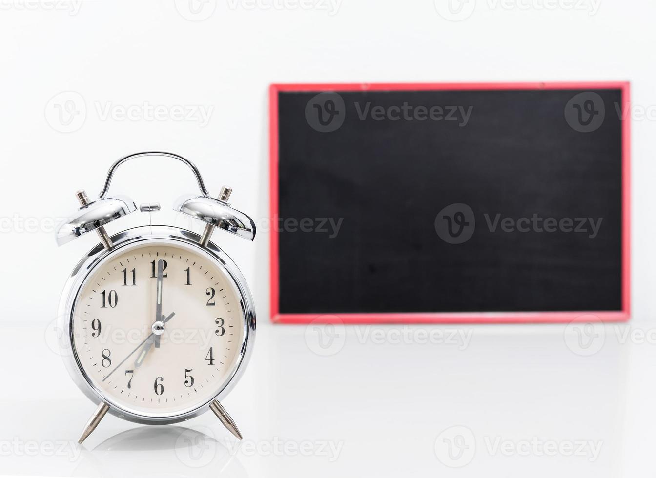 Chalkboard mock up and Silver alarm clock photo