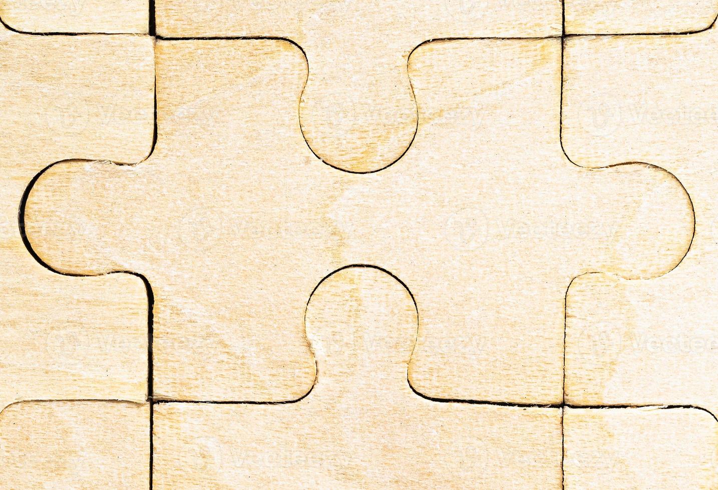 Blank wooden jigsaw puzzle photo