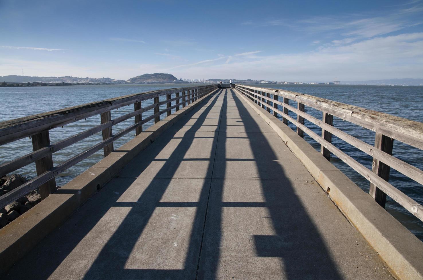 Long docks and its shadow in the sun photo