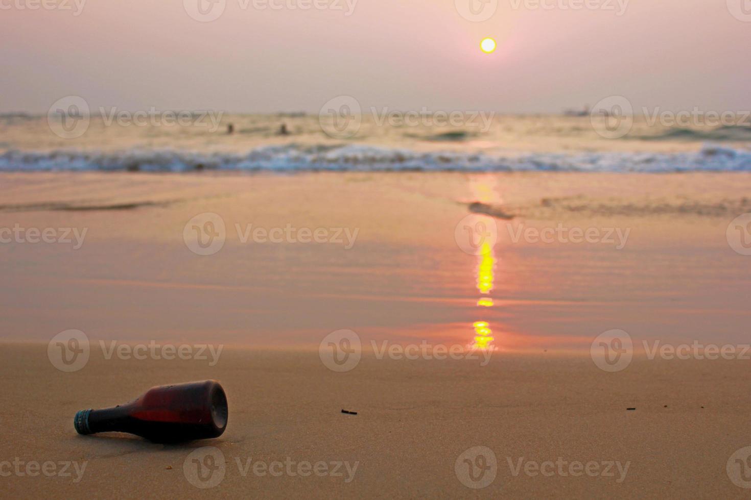 Sunset Beach with a Beer Bottle photo