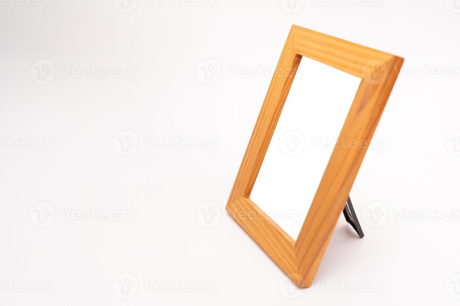 wooden photo frame. photo frame isolated on white background.