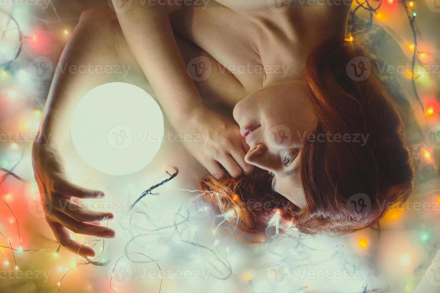 Close up person with brightly glowing sphere portrait picture photo